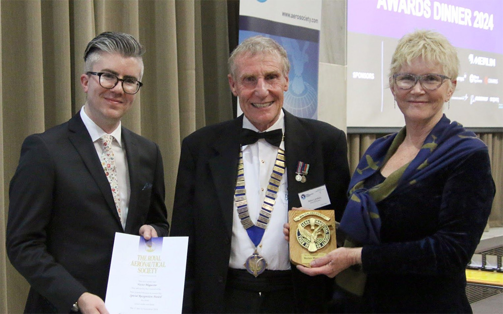 Brendan and Pen receiving their award