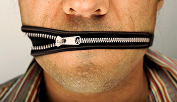 Man with zip for mouth